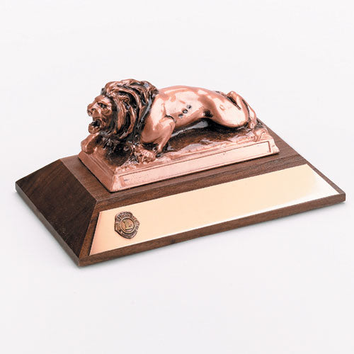 MODEL LION ON WOOD BASE